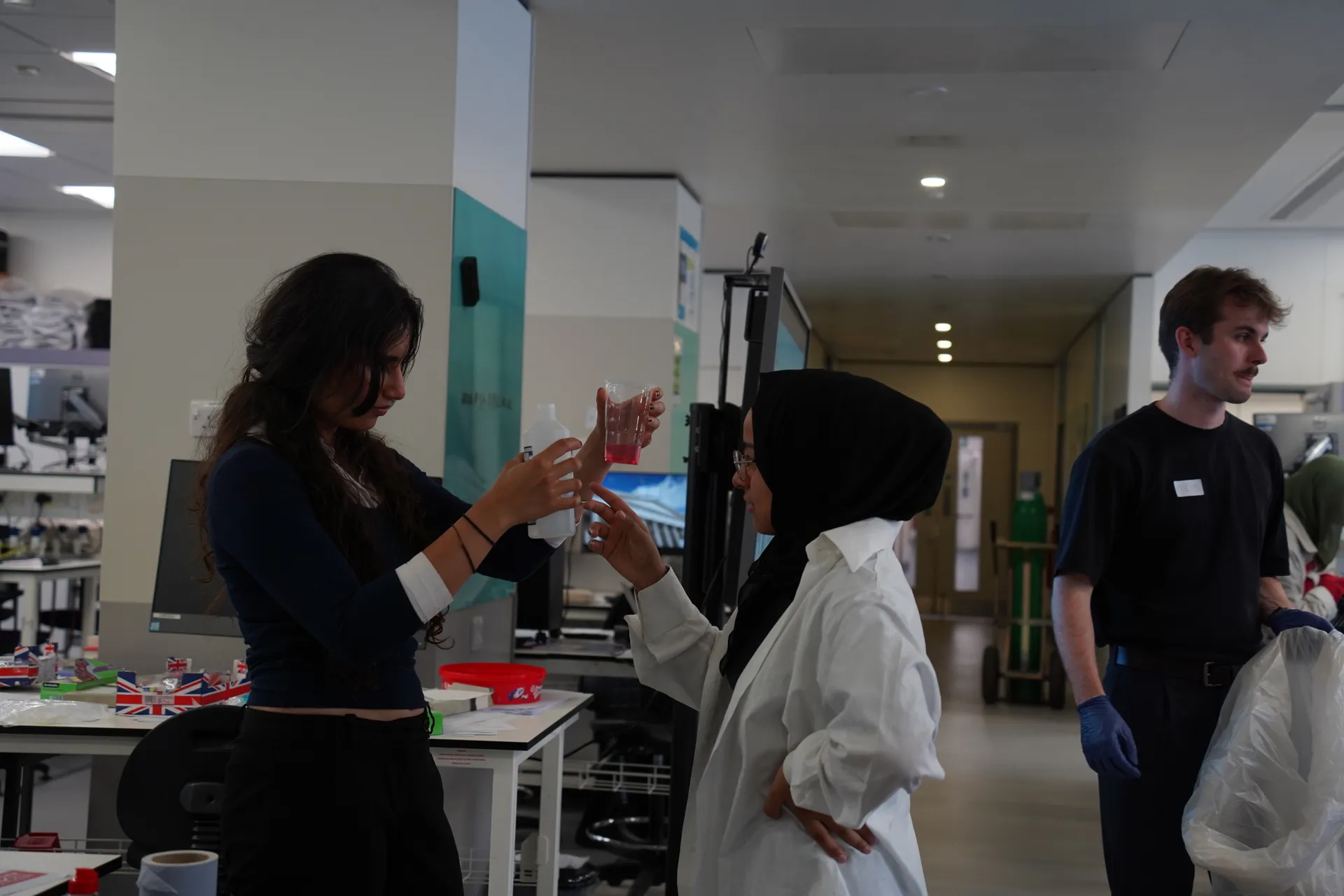 Students working through a practical science task at the Bridging the Future summer school